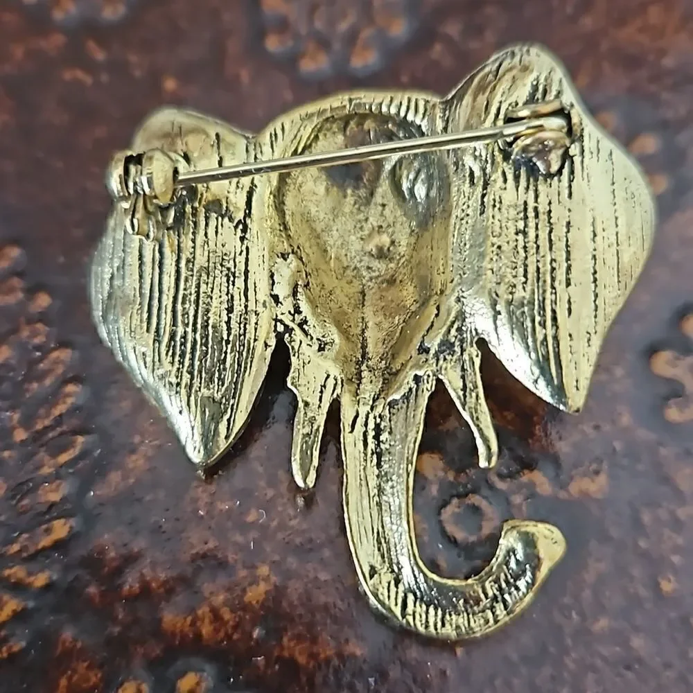 NWOT Gold tone crystal elephant brooch.